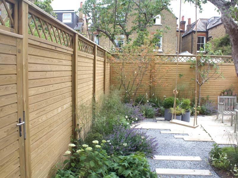 Horizontal timber garden fencing Cambridgeshire