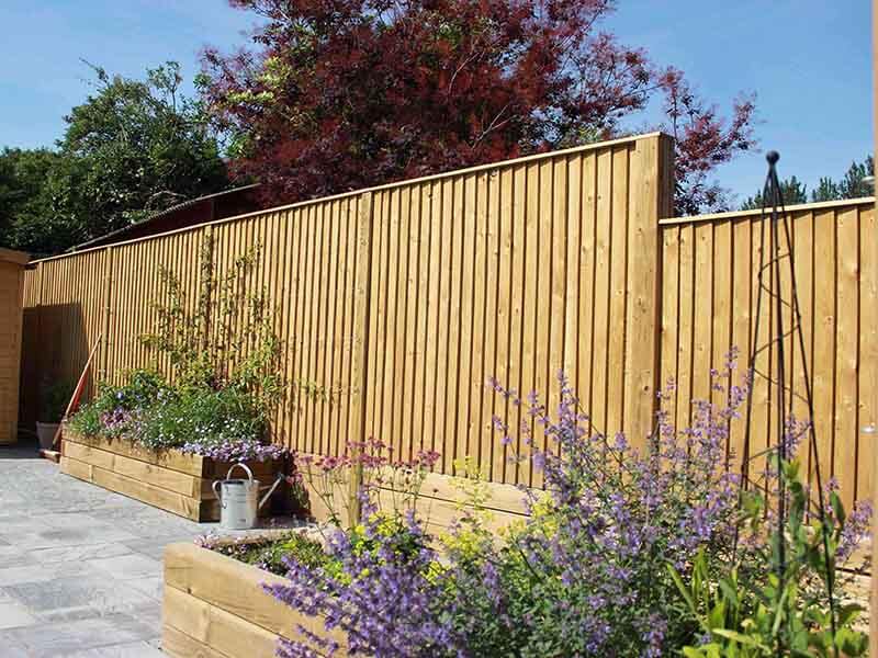 Pressure treated timber garden fence St. Ives